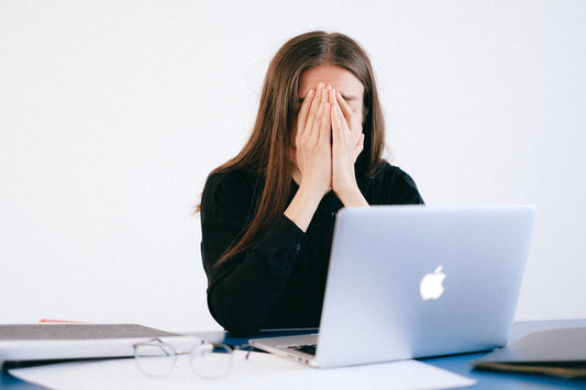 A woman experiencing anxiety from COVID-19.